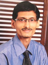 Dr. Amit B. Shah